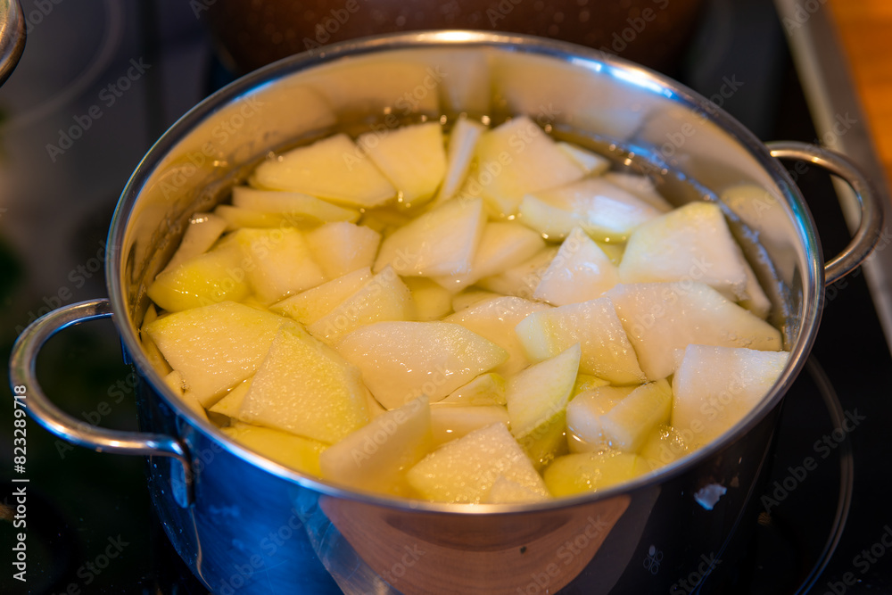 potatoes that cook in a saucepan potatoes that cook in a saucepan