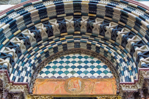 Details at facade of Genoa Cathedral or Metropolitan Cathedral of Saint Lawrence in Genoa, Italy.