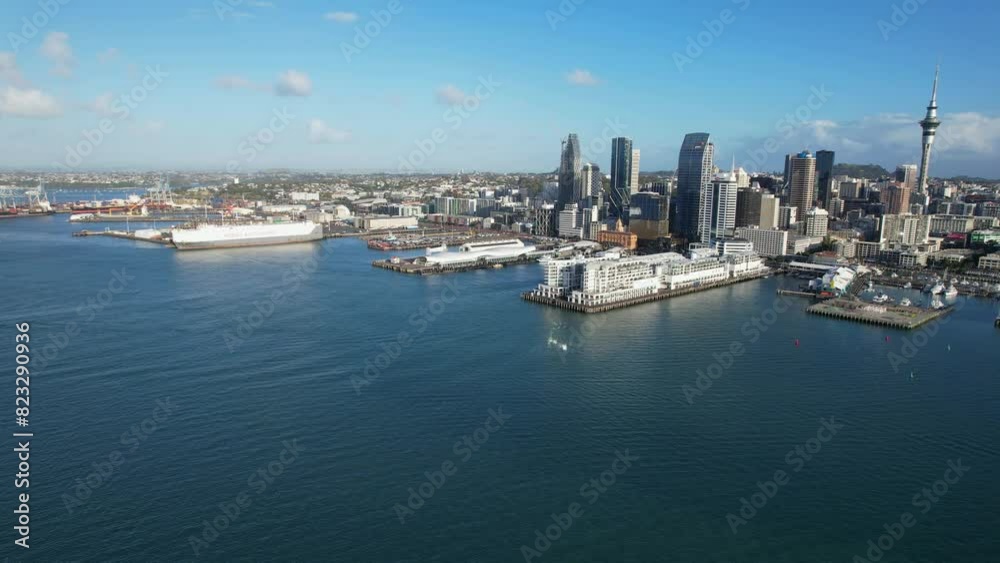 Aerial View Of Auckland CBD With Ports, Viaduct Harbour And Sky Tower In New Zealand. Aerial View Of Auckland CBD With Ports, Viaduct Harbour And Sky Tower In New Zealand.