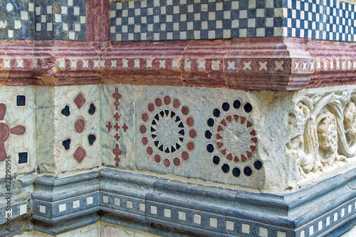 Details at facade of Genoa Cathedral or Metropolitan Cathedral of Saint Lawrence in Genoa, Italy.