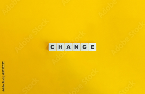 Change Word. Text on Block Letter Tiles on Flat Background. Minimalist Aesthetics. photo