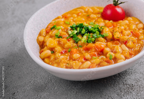 Homemade spicy chickpea stew with garnish