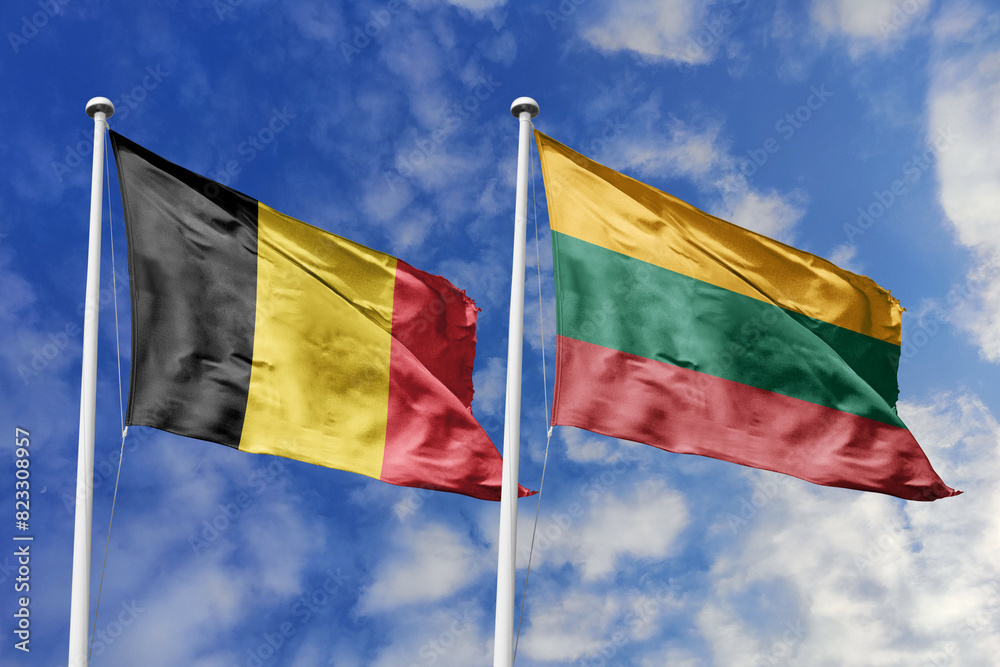 3d illustration. Belgium and Lithuania Flag waving in sky. High detailed waving flag. 3D render. Waving in sky. Flags fluttered in the cloudy sky. 3d illustration. Belgium and Lithuania Flag waving in sky. High detailed waving flag. 3D render. Waving in sky. Flags fluttered in the cloudy sky.