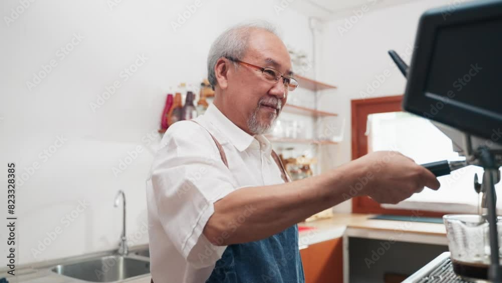 Senior Asian man barista is using a coffee maker. Bakery cafe and coffee shop small business owner concept Senior Asian man barista is using a coffee maker. Bakery cafe and coffee shop small business owner concept