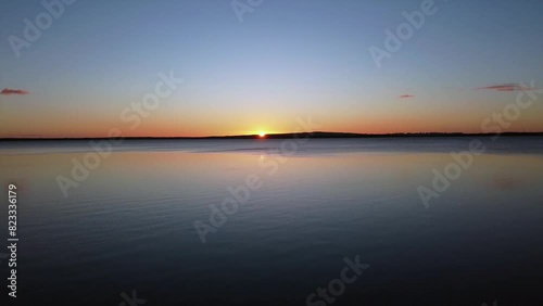 Lake Jamno sunset in Poland. A peaceful and captivating scene. photo