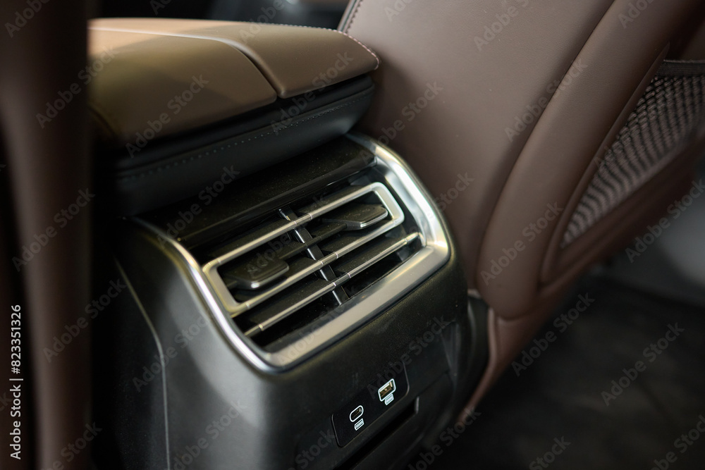 A close up of a car s rear air conditioning system