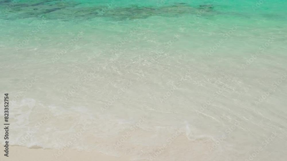 sea surf with turquoise water on sandy beach, slow motion
sea surf with turquoise water on sandy beach, slow motion