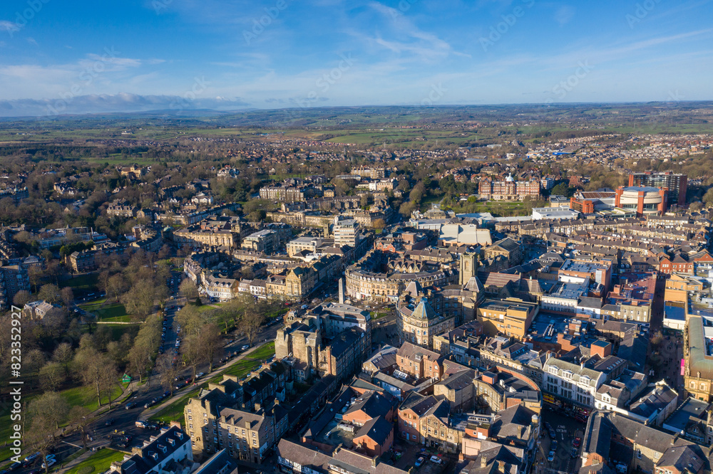 Aerial photo of the town centre of Harrogate North Yorkshire in the UK, showing a drone view of the whole of the town centre in the winter time on a sunny day
