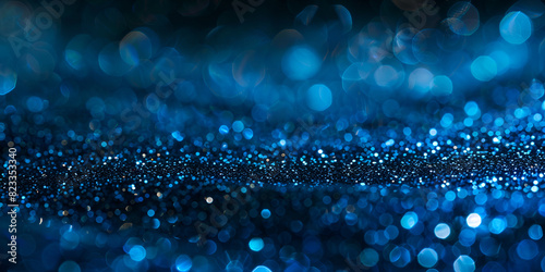 A blue background with small bubbles of water and stars of light in the sky and on the ground 