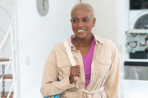 Beautiful black woman with nose piercing and dyed blond hair