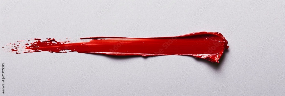 A vibrant red lipstick smudge stands out on a crisp white surface, creating a bold and chic contrast. Generative AI A vibrant red lipstick smudge stands out on a crisp white surface, creating a bold and chic contrast. Generative AI