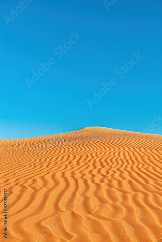 Endless beauty majestic sand dunes in the desert with a lone figure standing in the distance