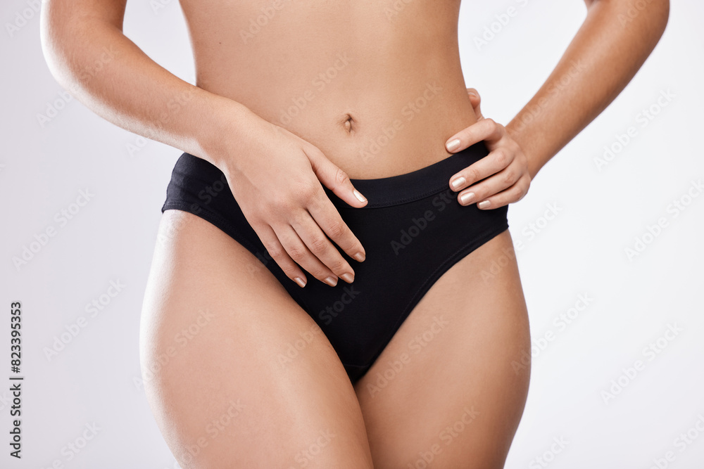 Underwear, hands and woman on diet for stomach, abdomen or lose weight isolated on white studio background. Panties, skin and model touch slim waist to check body for skincare health and wellness Underwear, hands and woman on diet for stomach, abdomen or lose weight isolated on white studio background. Panties, skin and model touch slim waist to check body for skincare health and wellness