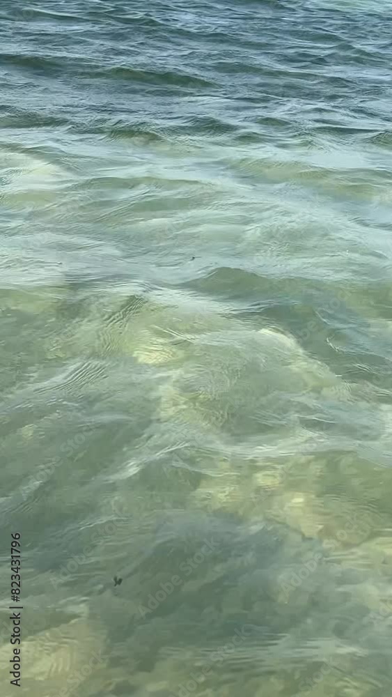 Nature background of clear transparent water texture on the sand Nature background of clear transparent water texture on the sand