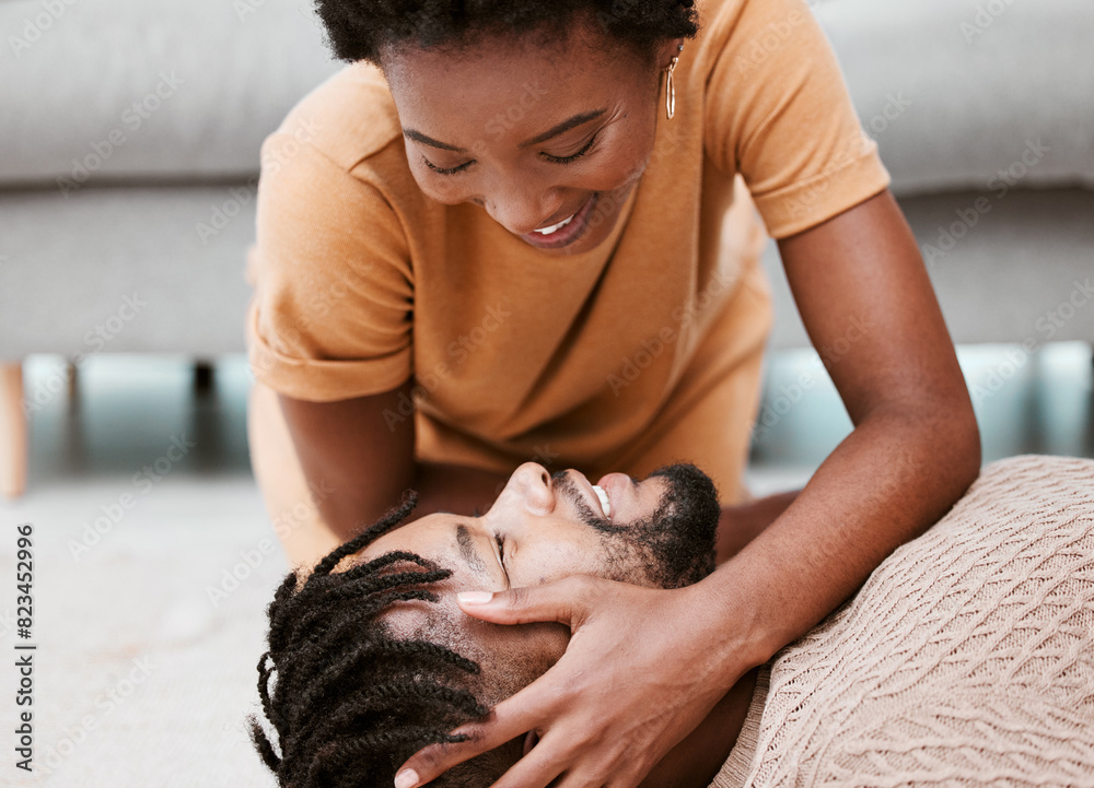Black couple, touch and floor for love in house, hand and woman together with man, smile and romance. Home, person and partner with happiness, care and relax on date, ground and rest in apartment Black couple, touch and floor for love in house, hand and woman together with man, smile and romance. Home, person and partner with happiness, care and relax on date, ground and rest in apartment