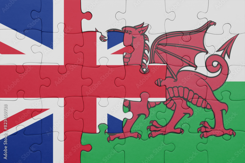 puzzle with the colourful national flag of wales and flag of great britain. puzzle with the colourful national flag of wales and flag of great britain.