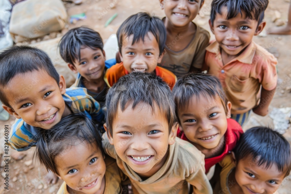 Group of asian kids smiling and looking at camera in the village