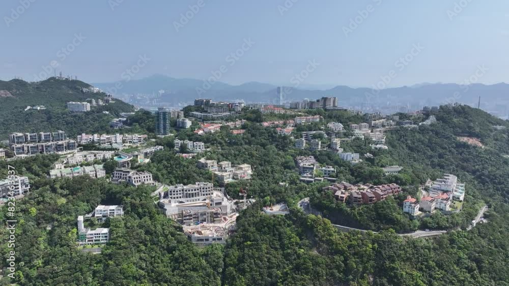 Exclusive luxury mansions perched atop Hong Kong's steep Peak, coveted addresses offering breathtaking Victoria Harbour vistas from opulent homes Exclusive luxury mansions perched atop Hong Kong's steep Peak, coveted addresses offering breathtaking Victoria Harbour vistas from opulent homes
