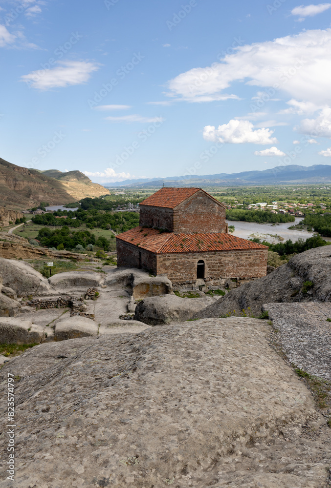 Uplistsikhe, Georgia, View of Ancient Cave Town and Church in Georgia with beautiful landscape