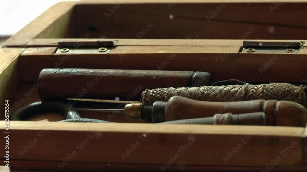 Old Leatherworking Awls in a Wooden Box. Close Up.