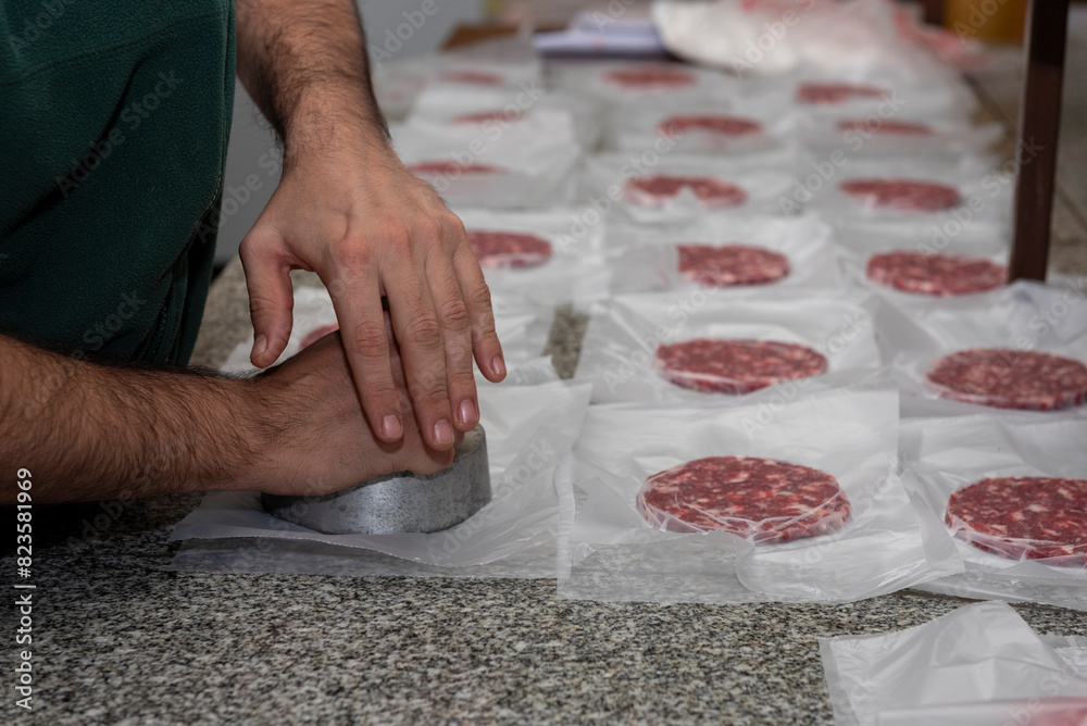 making homemade hamburgers with ground meat and chef making the medallions making homemade hamburgers with ground meat and chef making the medallions