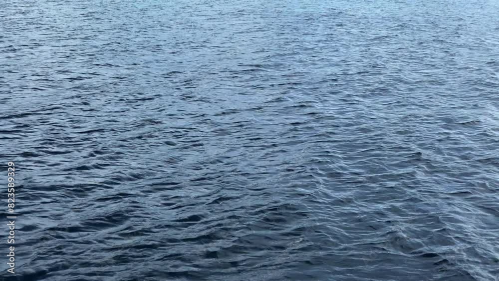 a wide sea with small waves flowing a wide sea with small waves flowing