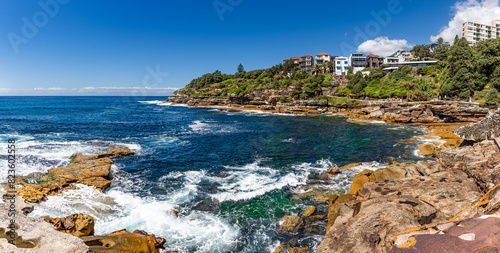 Sydney, Australia - Bondi to Bronte Coastal Walk. Famous hiking trail with sea views along the cliffs between famous Sydney beaches. photo