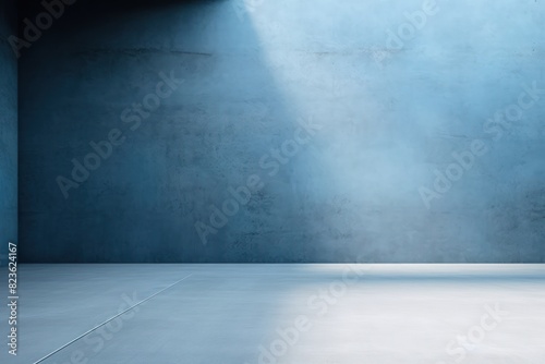The blue concrete wall and floor, adorned with interplay of light and shadow, set a captivating background.