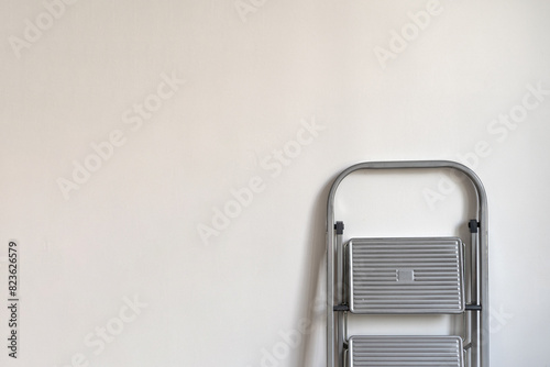 white background with ladder. Renovation apartment. repair and redecoration concept.