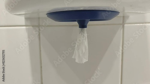 Sanitary paper tightens. The toilet is industrial. Public toilet. hygiene and health