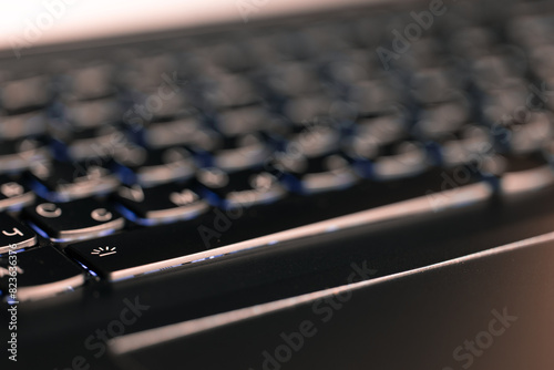 keyboard key "space" macro close up photography with illumination and blurred background