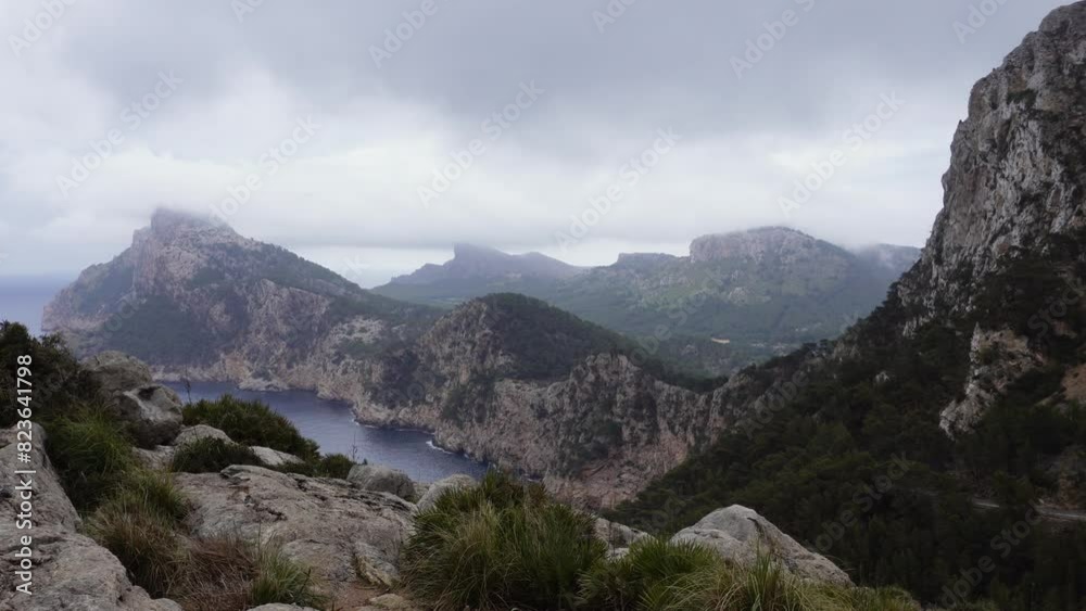 cape on the island, people rise above the cliff of the sea cape on the island, people rise above the cliff of the sea