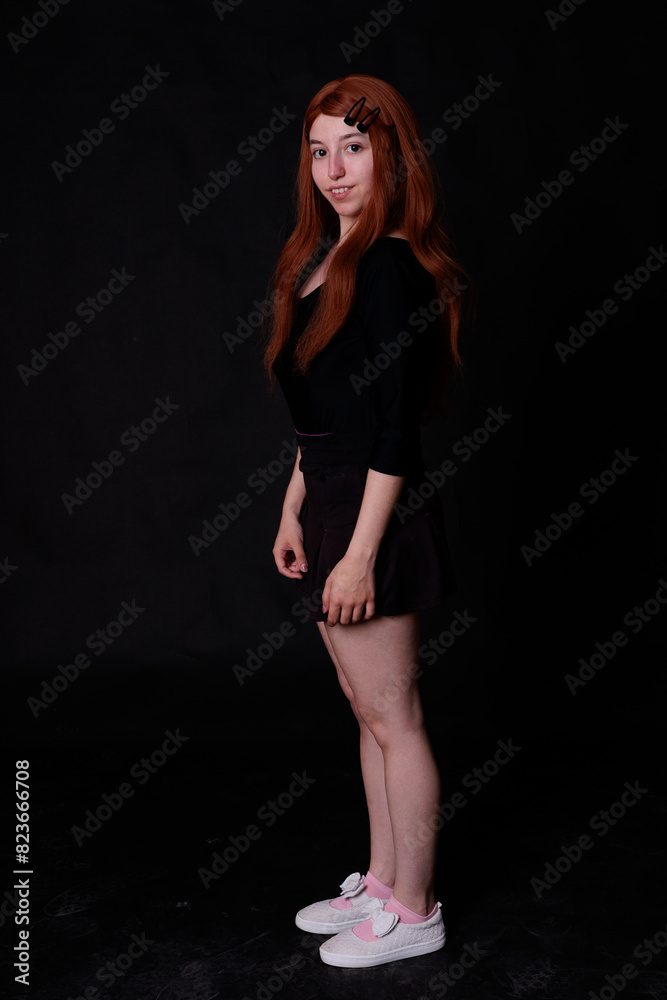 portrait photographs of a beautiful redhead woman on black background portrait photographs of a beautiful redhead woman on black background