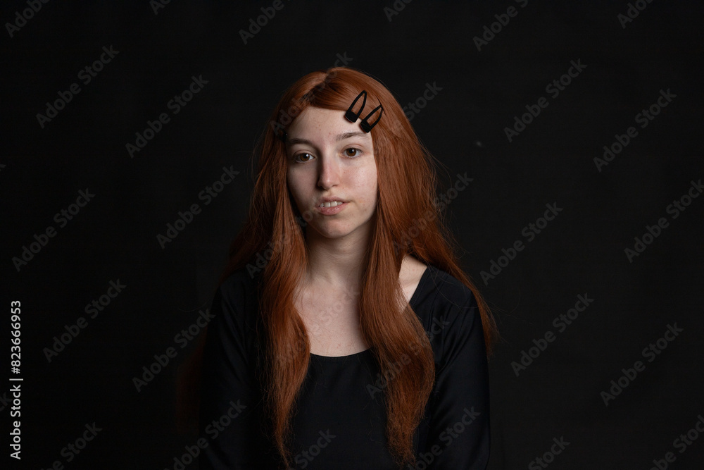 portrait photographs of a beautiful redhead woman on black background portrait photographs of a beautiful redhead woman on black background