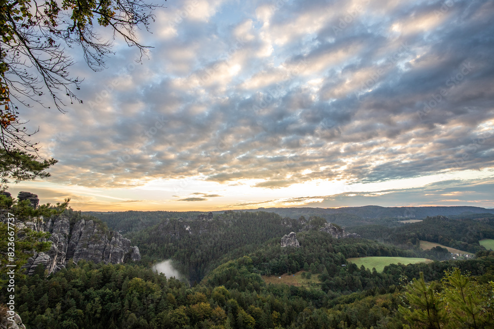 Landscape shot in the morning in a rocky landscape. On and around the Bastei Bridge in the Elbe Sandstone Mountains near Dresden, Saxony, Germany Landscape shot in the morning in a rocky landscape. On and around the Bastei Bridge in the Elbe Sandstone Mountains near Dresden, Saxony, Germany