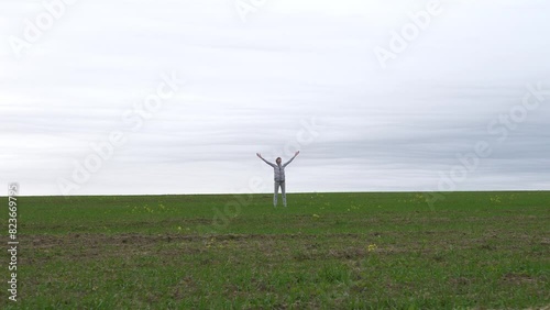 A young and beautiful girl does exercises in nature, yoga, breathing exercises and the like