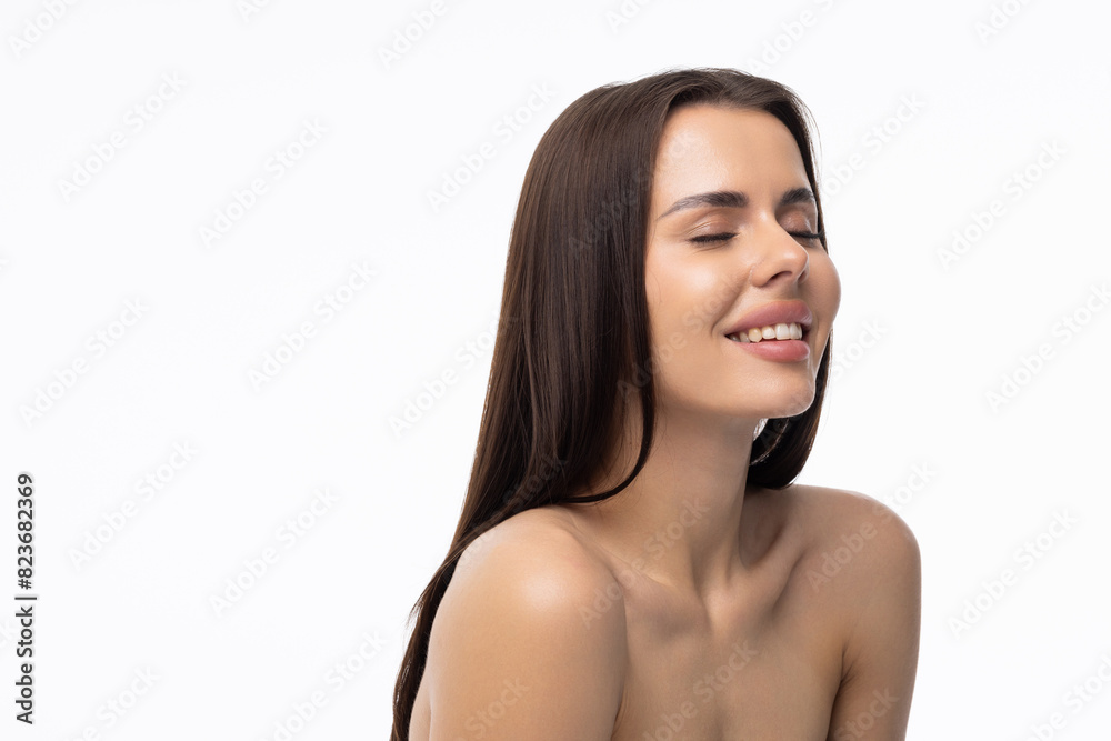 Beautiful young woman with clean perfect skin. Portrait of beauty model with natural nude make up and touching her face. Beautiful young woman with clean perfect skin. Portrait of beauty model with natural nude make up and touching her face.