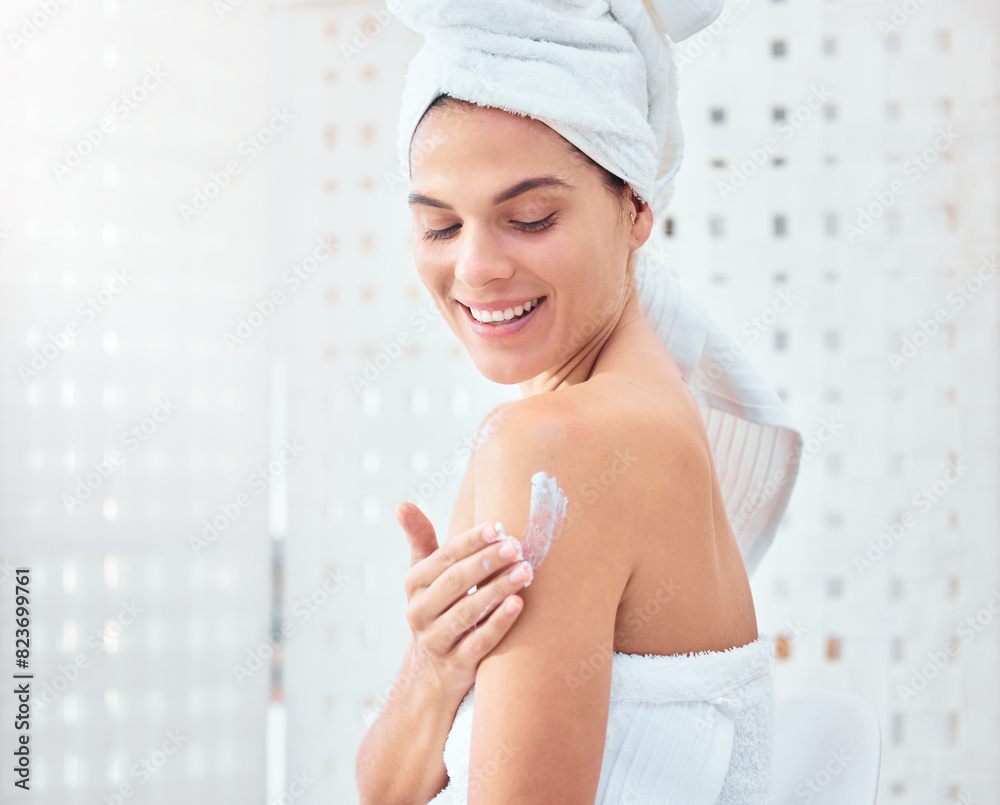 Woman, towel and moisturizing lotion in bathroom for healthy skincare, application or morning routine. Female person, shoulder and smile or dermatology cream with cleaning hygiene, shower or home Woman, towel and moisturizing lotion in bathroom for healthy skincare, application or morning routine. Female person, shoulder and smile or dermatology cream with cleaning hygiene, shower or home