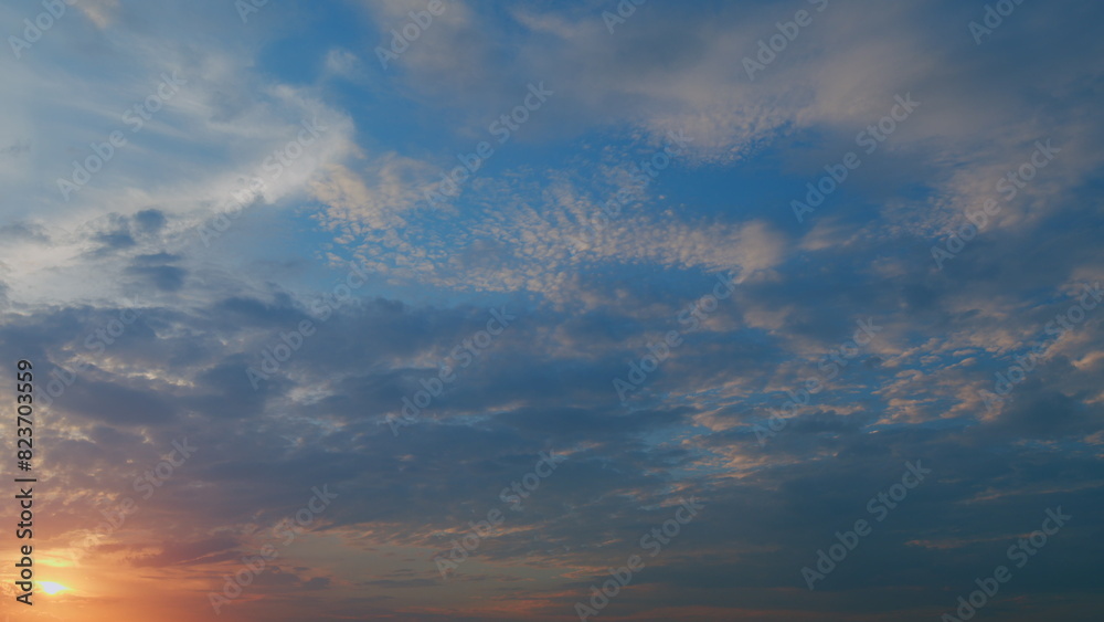 Sun on sunset evening with clouds. Day to evening transition. Nature landscape scence. Timelapse.