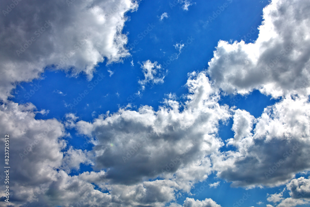 Blue sky with sunlight and beautiful white clouds. Blue sky with sunlight and beautiful white clouds.