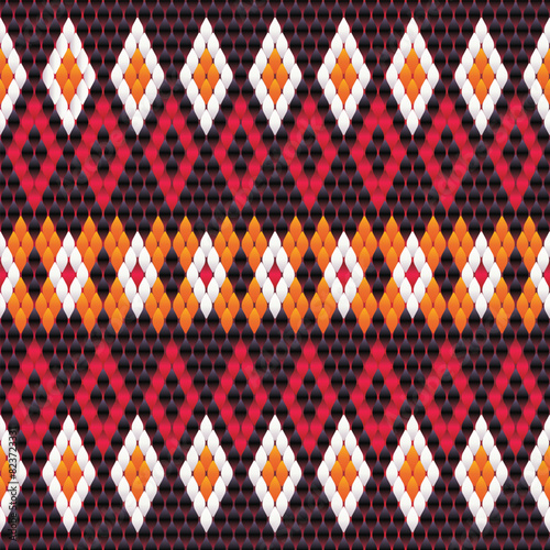 Ikat geometric folklore ornament. Tribal ethnic vector texture. Seamless striped pattern in Aztec style. Figure tribal embroidery. Indian, Scandinavian, Gypsy,