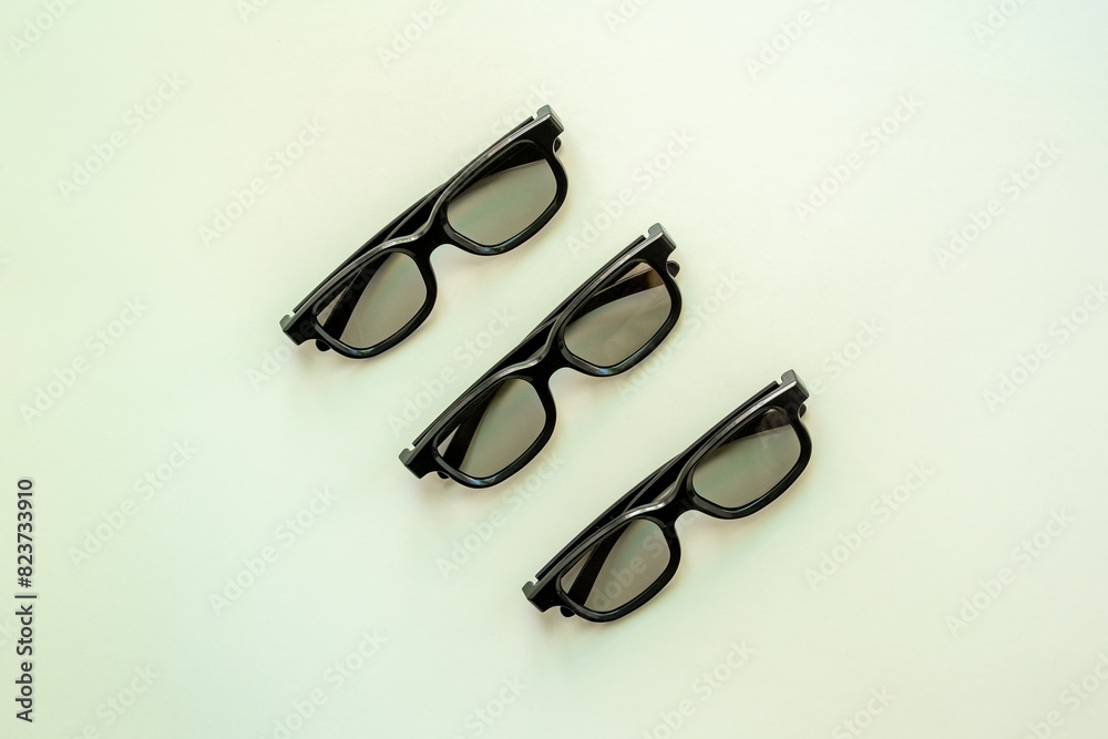 Set of glasses in optics store, top view. Eyesight and vision concept Set of glasses in optics store, top view. Eyesight and vision concept
