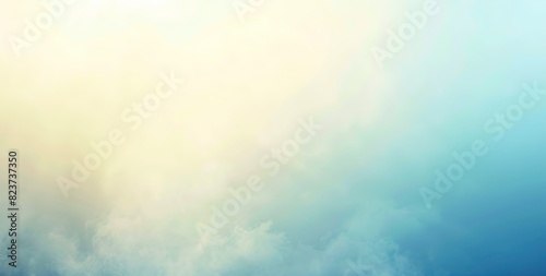 Gradient sky with airy clouds of blue and yellow tones blending smoothly. Minimalistic design of backgrounds, textures and presentations on theme of nature