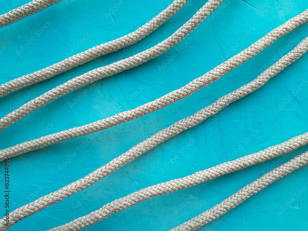 Ropes on blue textured background