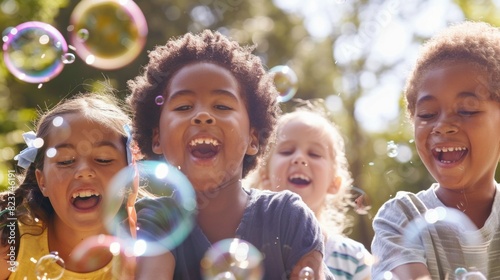 A group of children are playing with bubbles in a park
