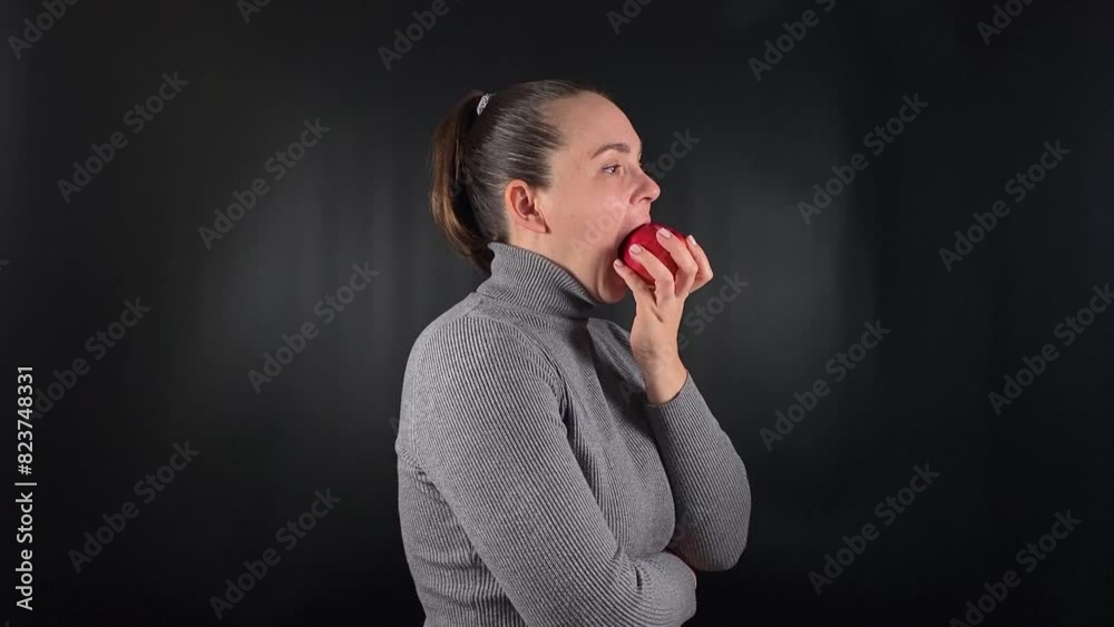 Captivating portrait a beautiful young woman wearing a grey sweater isolated on a sleek black backdrop, preparing to eat meal, exuding an effortless cool vibe. Lifestyle, fashion or culinary Captivating portrait a beautiful young woman wearing a grey sweater isolated on a sleek black backdrop, preparing to eat meal, exuding an effortless cool vibe. Lifestyle, fashion or culinary