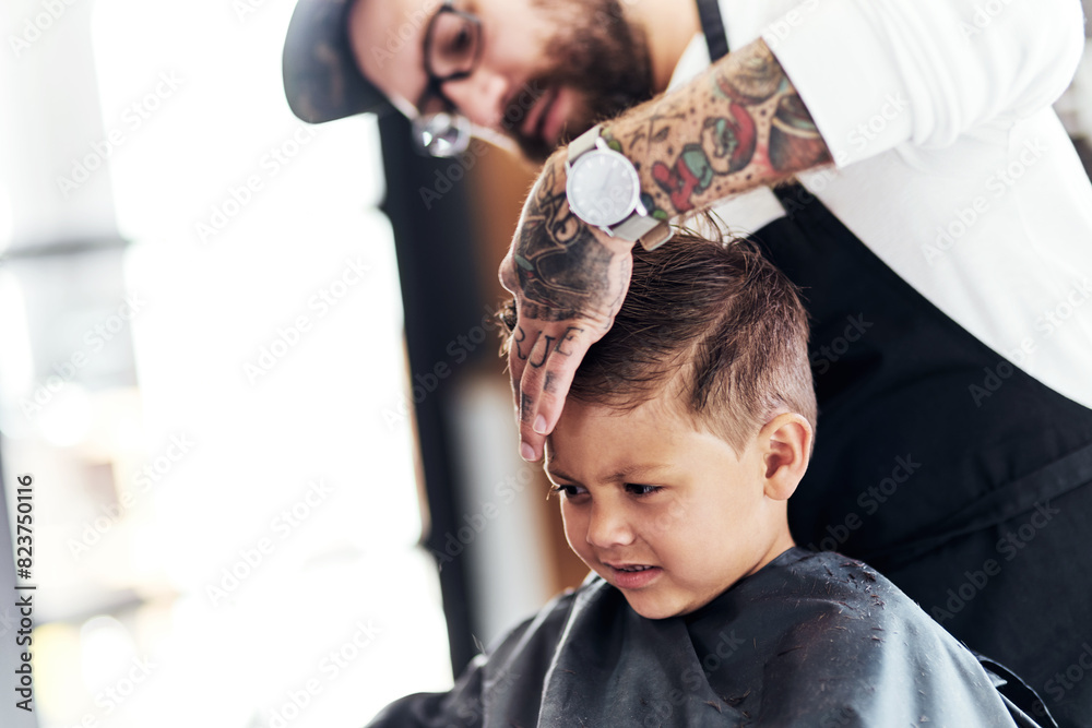 Barbershop, man and boy with haircut, comb and hairdresser treatment at salon with barber. Kid, grooming and beauty service with professional and entrepreneur work on hair care and customer styling Barbershop, man and boy with haircut, comb and hairdresser treatment at salon with barber. Kid, grooming and beauty service with professional and entrepreneur work on hair care and customer styling