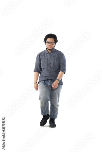 full body portrait of an Asian man wearing glasses walking on a white background