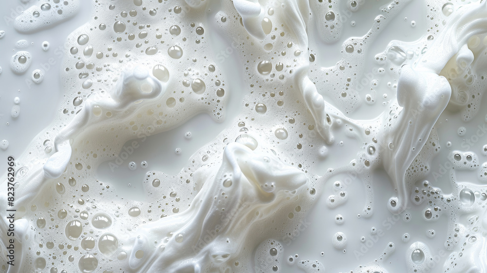 Close up of creamy soap foam texture on a white background, perfect for cleaning, hygiene, and skincare. The frothy bubbles create a luxurious lather, ideal for bath time and pampering Close up of creamy soap foam texture on a white background, perfect for cleaning, hygiene, and skincare. The frothy bubbles create a luxurious lather, ideal for bath time and pampering