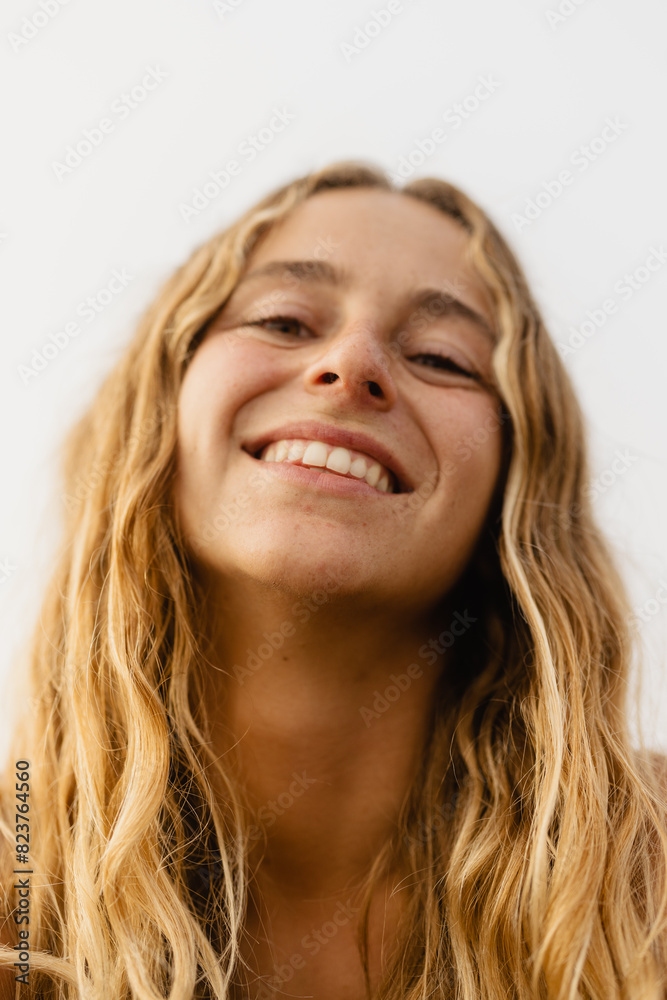 portrait of a woman with natural wavy blonde hair portrait of a woman with natural wavy blonde hair